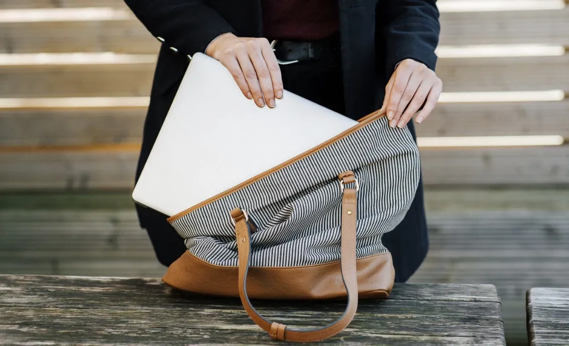 Grab your essentials to the interview: your interview packet, portfolio, and backup. Photo by Anete